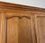 Vintage Louis XVI French Three Door Oak Carved Armoire For Sale - Image 5 of 13