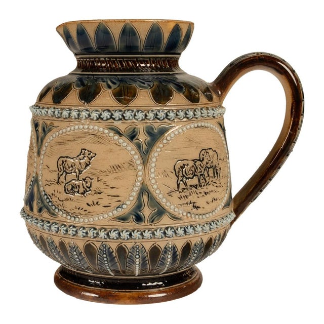 A charming Antique Doulton Lambeth Aesthetic Movement stoneware jug, decorated by the celebrated Hannah Barlow, signed and...
