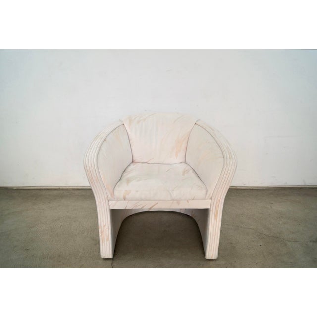 1980's Art Deco barrel back lounge armchair for sale. It's a beautiful chair that is structurally solid and sound, and has...