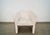 1980's Art Deco barrel back lounge armchair for sale. It's a beautiful chair that is structurally solid and sound, and has...