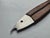A classic Midcentury Modern fish-shaped bottle opener, made of stainless steel with dark-brown tan leather. Model #4687,...