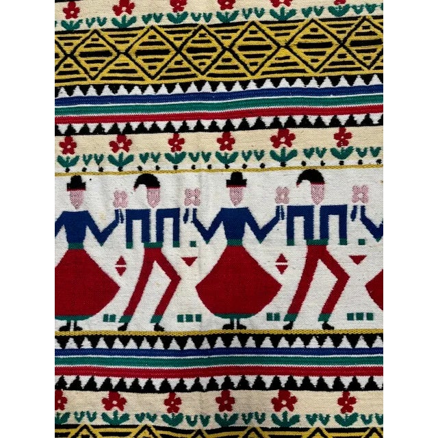 Decorative rug/wall hanging; handmade Multicolor: red, white, blue, green, black On one side figurines are in red/blue; on...