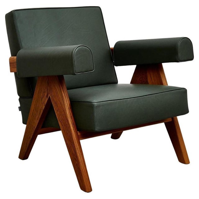 Experience timeless elegance and exceptional craftsmanship with the pierre jeanneret armchair, originally designed circa...