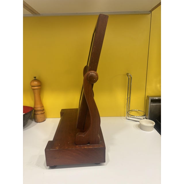 This desk mirror, or toilet mirror with a small pool drawer has been in my family for as long as I can remember. It’s a...