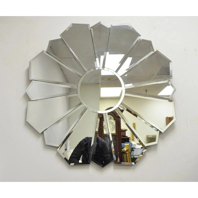 Vintage Hollywood Regency Beveled Glass Sunburst Flower Petal Wall Mirror. Item features a unique sunburst/flower petal...