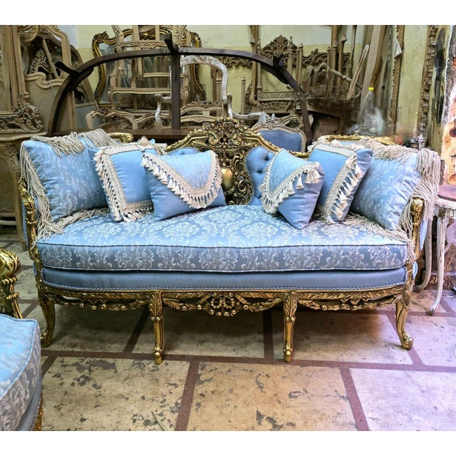 Introduce timeless French elegance into your home with this magnificent Louis XV style three-seater sofa, masterfully...