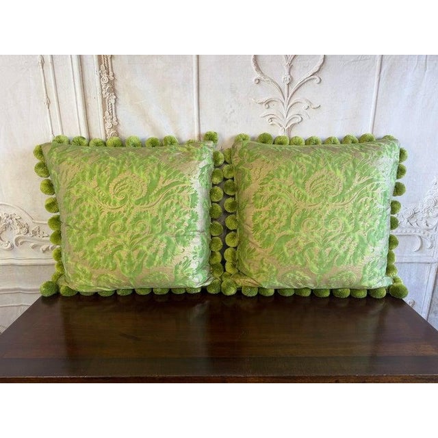 An exquisite and exceedingly chic pair of custom-made designer throw pillows using original Fortuny fabric, executed in...