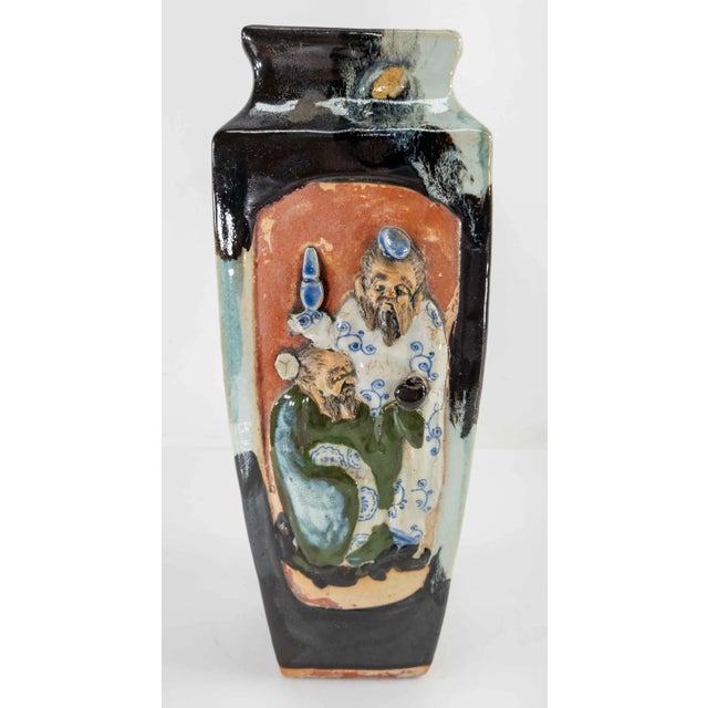 We are selling this antique Japanese Sumidagawa pottery vase. This vase of typical style has raised characters with floral...