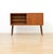 A beautifully proportioned Danish Modern cabinet crafted in teak, featuring clean lines and a warm, richly grained finish....