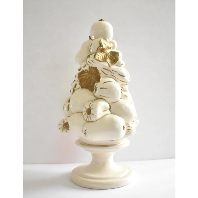 A vintage, mid-century Italian majolica ceramic centerpiece sculpture, featuring a topiary tower of fruit, white and gold,...