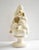 A vintage, mid-century Italian majolica ceramic centerpiece sculpture, featuring a topiary tower of fruit, white and gold,...
