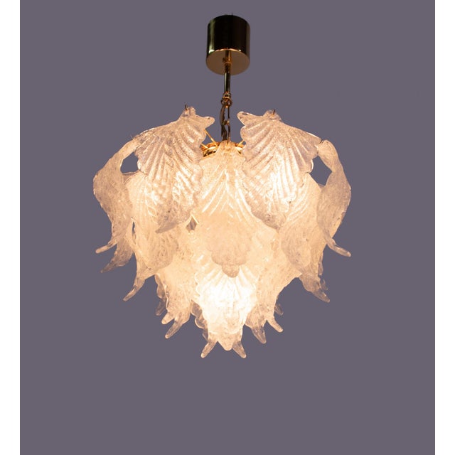 Elegant venetian murano glass petals chandelier with 25 white, semi-transparent glass elements individually suspended on a...