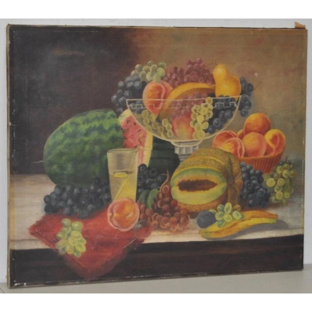 This is a late 19th century Americana fruit still life oil painting. This overflowing table of fruit and drink, is classic...