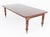 A handsome Victorian extending dining table, crafted in rich mahogany and raised upon elegant ring-turned and fluted legs,...