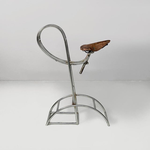 Italian bar stool with brown leather bicycle seat and chromed metal, 1970s Bar stool with brown leather seat shaped like...
