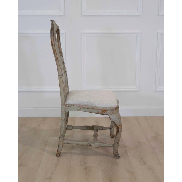 These rococo chairs were made in Sweden around 1770 and have been scraped back to their original paint and newly...