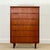 Beautifully handcrafted in Denmark during the 1960s, this elegant Mid-Century tall chest of drawers embodies the timeless...