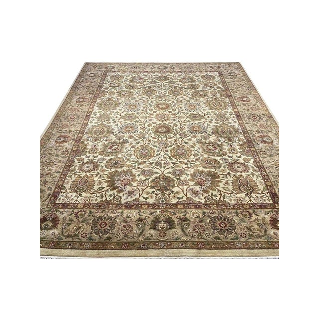 Enhance your home with the captivating beauty of this 10x14 Handwoven Indian Agra Area Rug. Handwoven in India, this rug...
