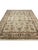 Enhance your home with the captivating beauty of this 10x14 Handwoven Indian Agra Area Rug. Handwoven in India, this rug...