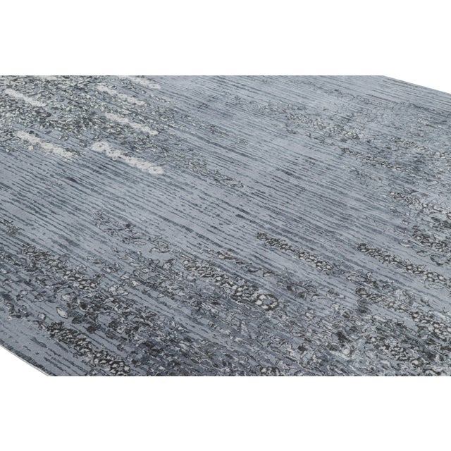 This hand-knotted wool 8x11 rug represents a bold new line of Rug & Kilim’s Modern Collection—a series of contemporary...