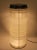 Exceptional floor lamp from HOLOPHANE, FRANCE. Glass cylinder. On iron base with aluminum cover. The cabling, including...