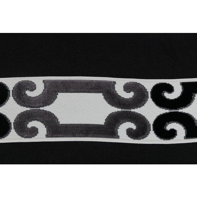 Custom high-end designer lumbar pillow cover in black velvet fabric with geometric tape on front. Solid coordinating...