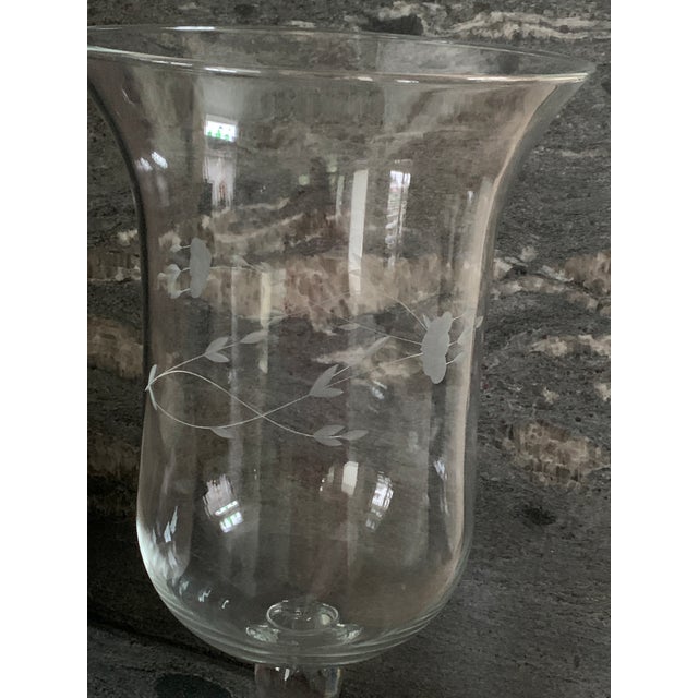 Large vintage etched glass hurricane pedestal vase or candle vessel. Etched delicate floral pattern and leaves with a...