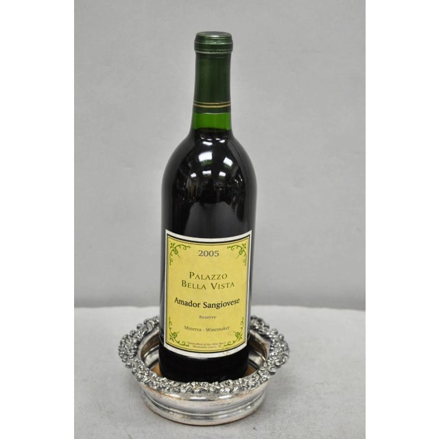 Antique English Victorian Silver Plated Floral Repousse Mahogany Bar Wine Bottle Coaster. Circa Early 20th Century....