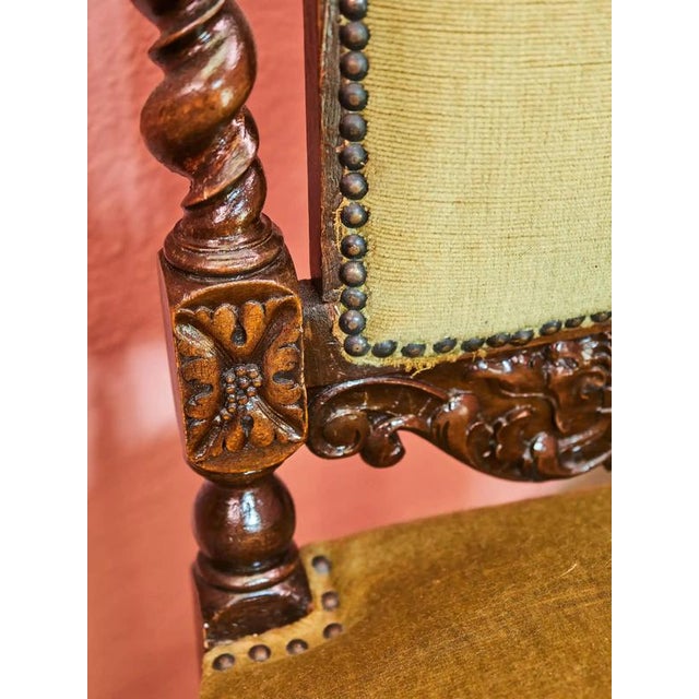 Representative pair of Renaissance-style chairs made of solid oak, made in the second half of the 19th century. They come...