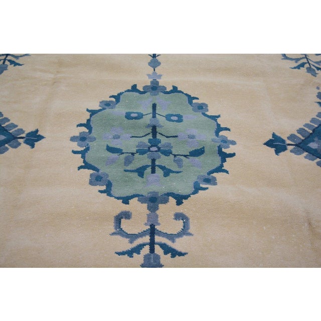 Hand-knotted with care using traditional rug-making techniques, this wool rug blends timeless craftsmanship with a modern...