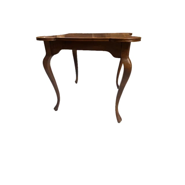 Beautiful antique wooden game table with cabriole legs. In good, sturdy condition. Lovely patina. Approx. 32” L x 32” D x...