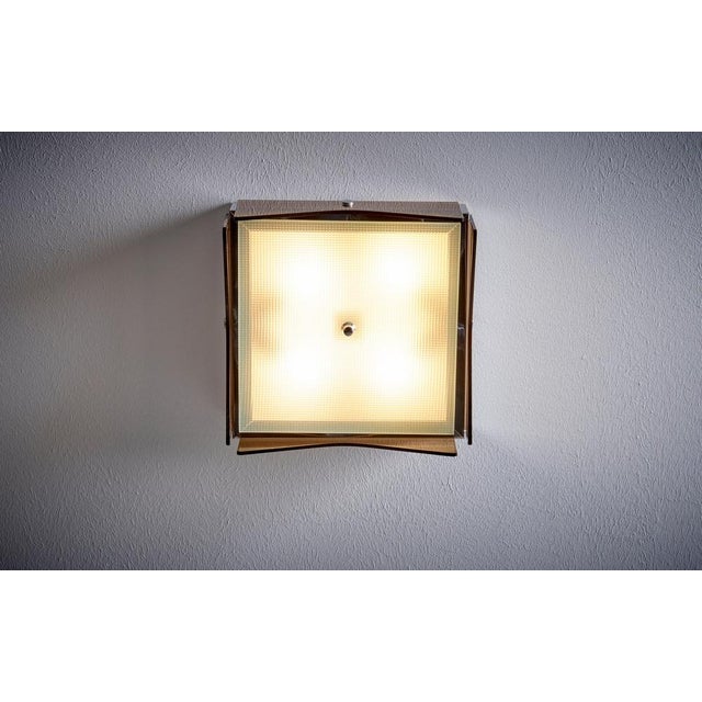 1960s Design Italian Wall Lamp nos in tinted brown glass. Up to 250V (Europe/UK Standard).The wiring of this item may be...