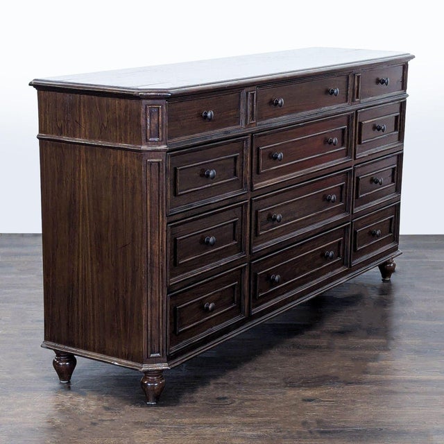 This dresser from Millcreek Furniture features a rich dark wood finish and offers plenty of storage with 12 spacious...
