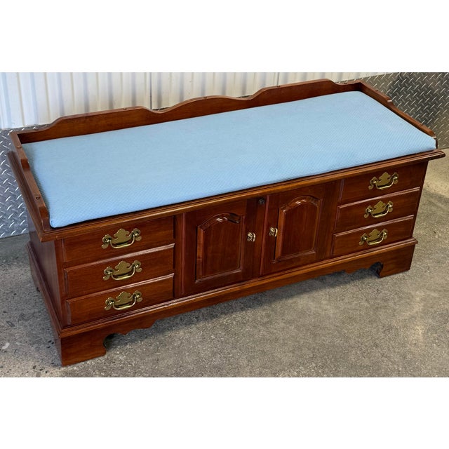 Beautiful cedar chest by Lane Furniture. Features classic Chippendale styling with polished brass hardware , mock drawers...