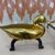 A pair of vintage andirons with brass ducks. Probably 1970’s and American. Ducks- 14 1/4” w x 3” d x 5 3/4” h