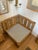 Vintage corner lounge chair with solid oak frame and vertical slat back design. Newly upholstered seat and back cushions...