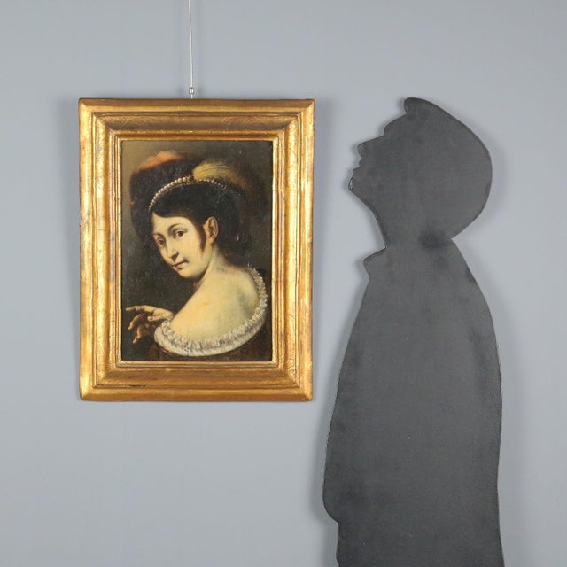 Oil on panel portrait depicting a young woman from the 16th century, executed with a painting technique inspired by 16th-...