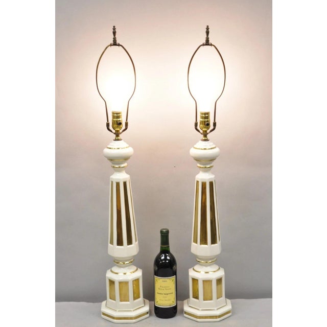 Vintage Italian Hollywood Regency Cream & Gold Porcelain Column Table Lamps - a Pair. Circa Mid 20th Century....