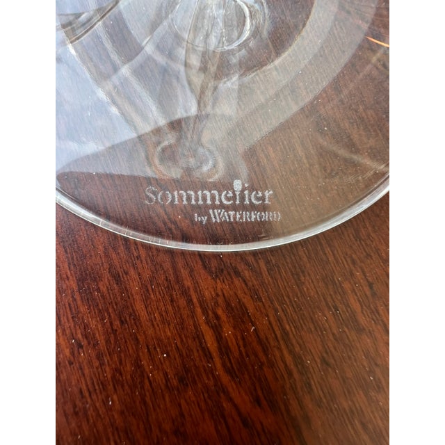 Four Sommerlier Wine Glasses by Waterford . Waterford Crystal is a well known maker of Crystal .