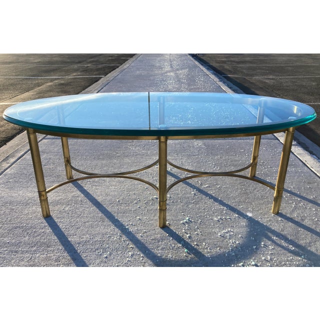 Vintage Asian influenced brass and heavy 3/4” thick glass top with ogee beveled edge in faux bamboo, manufactured in Italy...
