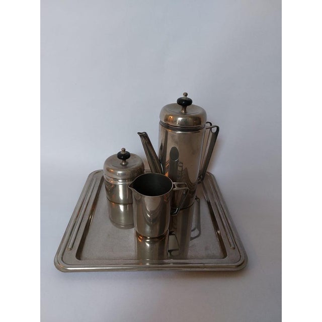 This item is silver plated and in good condition. coffee pot, sugar bowl with lid, creamer and serving tray.