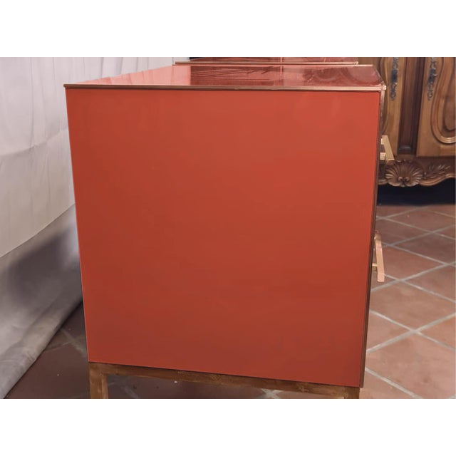 Embellish your bedroom with these exquisite Italian bedside tables, featuring terracotta-coloured Murano glass tops and...