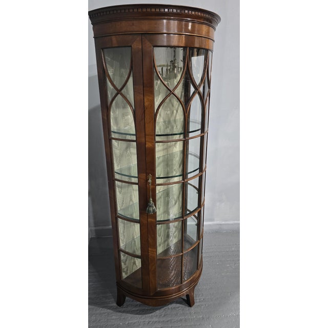 Wonderful deep demi lune mahogany display cabinet, with astra glazing bars, four heavy glass shelves, standing on outswept...