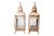 A pair of rustic pagoda shaped lanterns. The metal frame has four side ribs that support glass panels with reticulated...