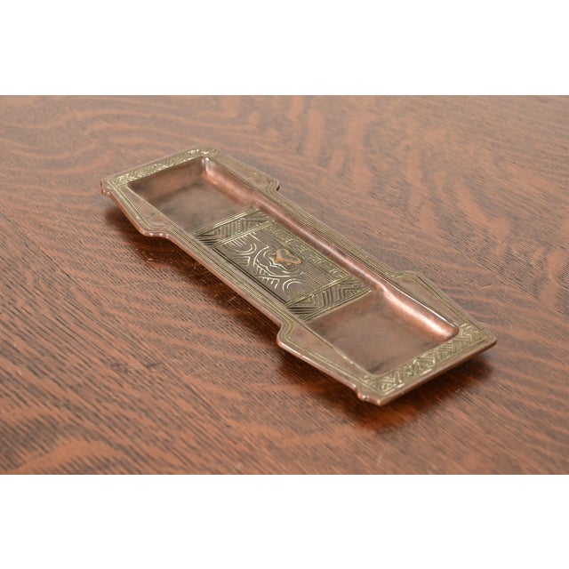 A gorgeous antique Arts & Crafts or Art Deco period "American Indian" pattern bronze pen tray By Tiffany Studios (signed...