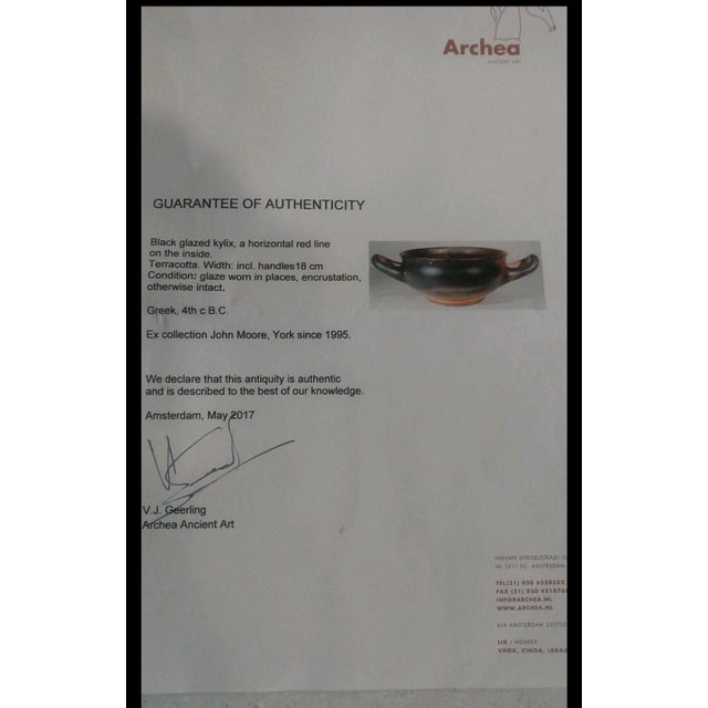 Greek Black Glazed Kylix - Ancient Bowl With Authentication Document Black Glazed kylix , a horizontal Red Line on the...