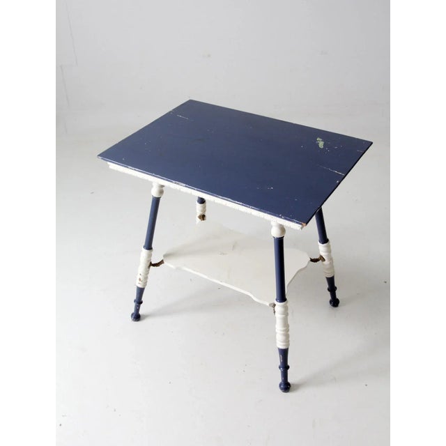 19th century antique turned leg side table featuring an original as-found royal blue painted finish with white accents....