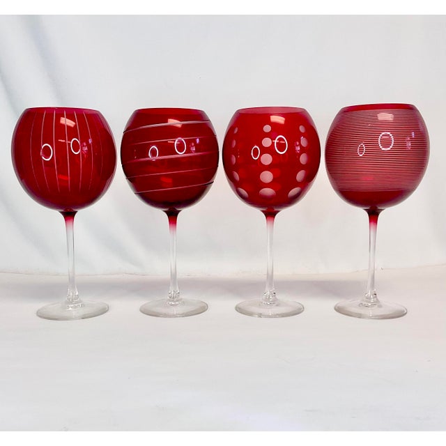These are a stunning set of Ruby Red Balloon Wine Glasses. They are 9.5” tall and feature large balloon cups with etched...