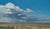 "Where It Gathers" is an oil on canvas landscape painting by Michael Magrin, completed in 2026. A long bank of clouds runs...