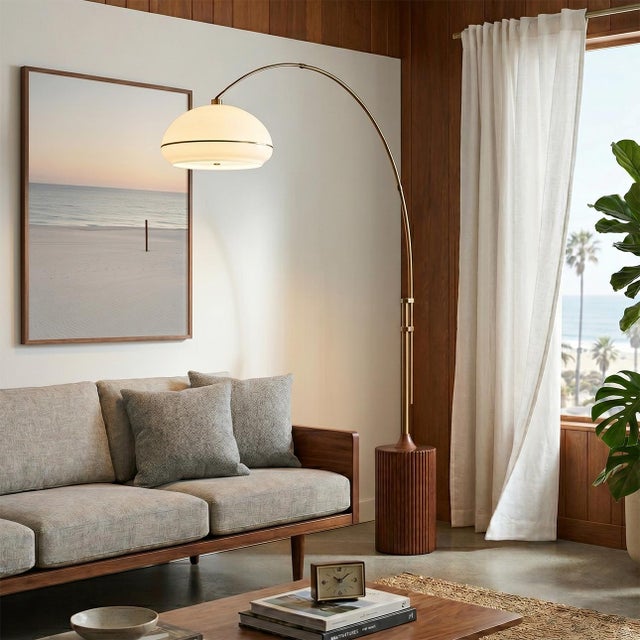 Bring timeless sophistication and warm ambient lighting into your home with this stunning Mid Century Modern Arc Floor...